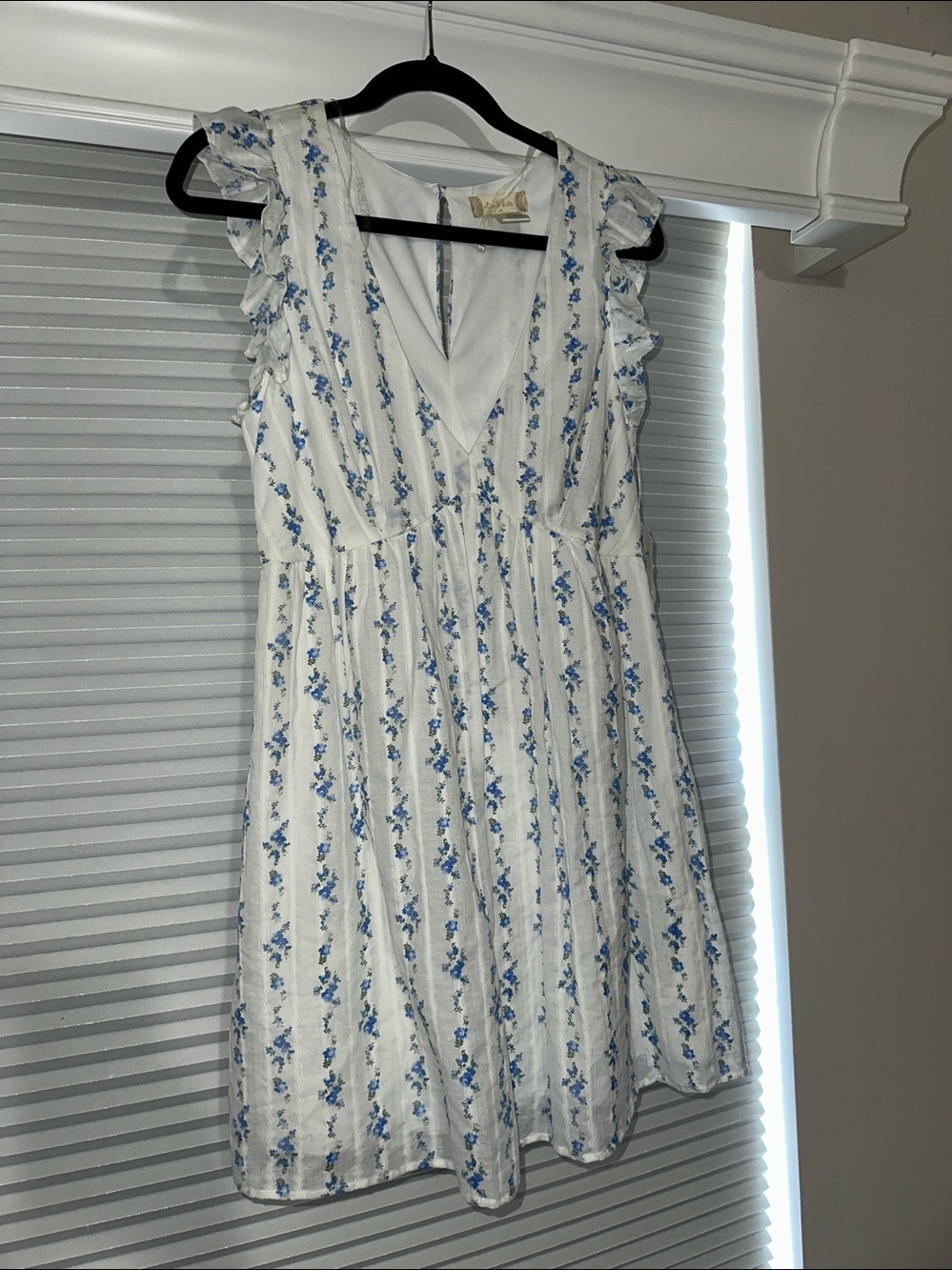 Altar’d State. White Floral Ruffled V-Neck Sundress with Blue Print